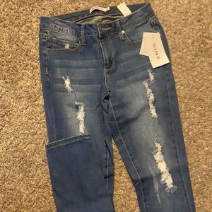 Skinny jeans with worn look, dark wash
